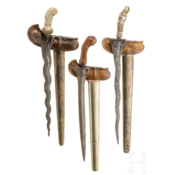 Three Indonesian kerises with handles of bone and wood, circa 1900