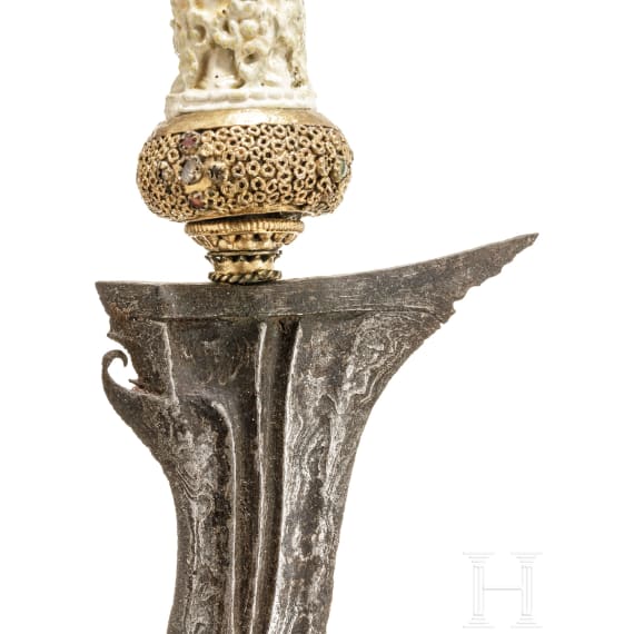 Three Indonesian kerises with handles of bone and wood, circa 1900