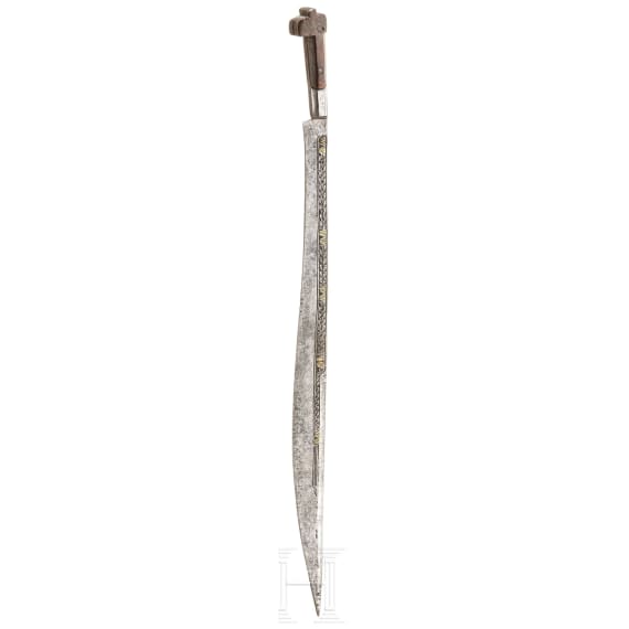 A brass-inlaid North African Flyssa knife, 19th century