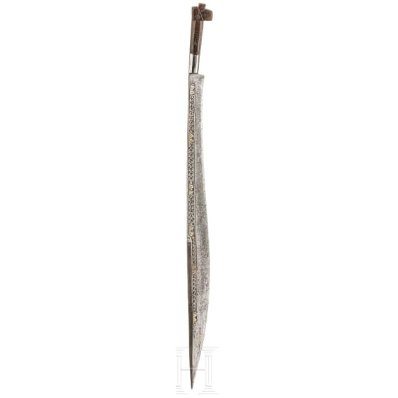 A brass-inlaid North African Flyssa knife, 19th century