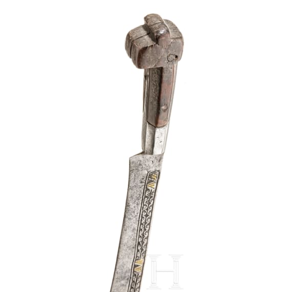 A brass-inlaid North African Flyssa knife, 19th century