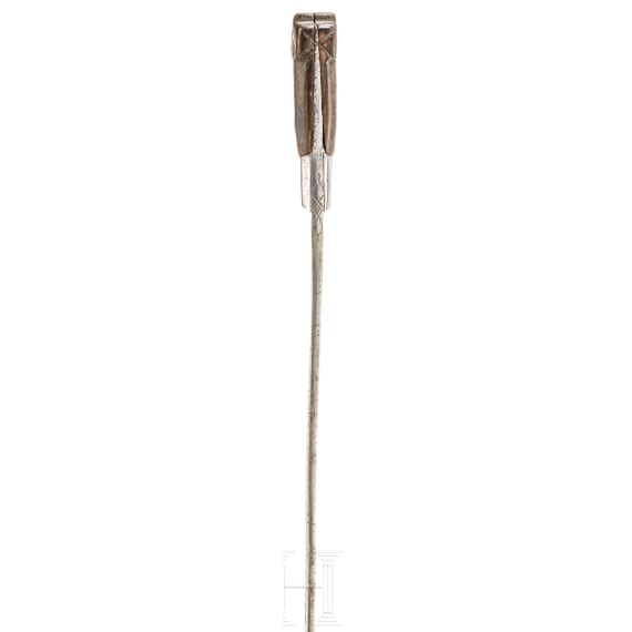 A brass-inlaid North African Flyssa knife, 19th century