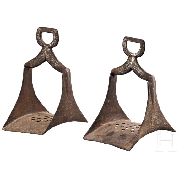 A pair of Moroccan silver damascenend stirrups, 19th century