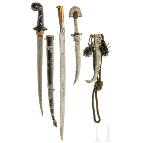 A North African yatagan and two daggers, 19th/20th century