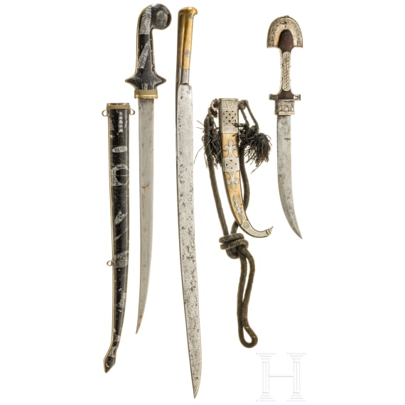 A North African yatagan and two daggers, 19th/20th century