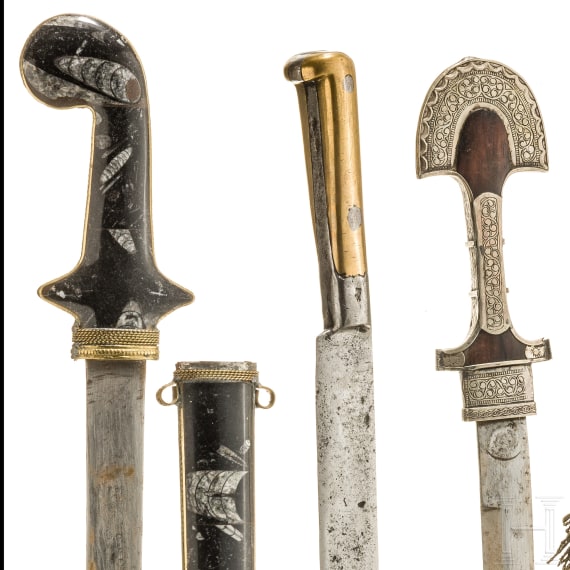 A North African yatagan and two daggers, 19th/20th century