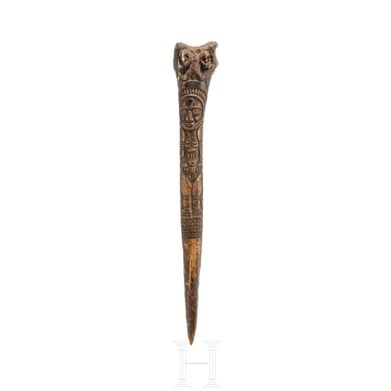 A Papua New Guinean carved bone dagger, 19th century