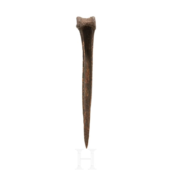 A Papua New Guinean carved bone dagger, 19th century