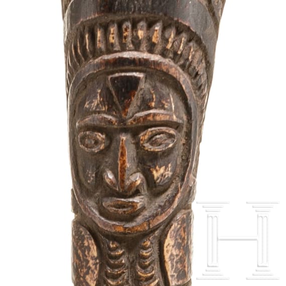 A Papua New Guinean carved bone dagger, 19th century