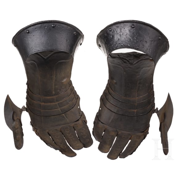A pair of German black and white gauntlets, circa 1580
