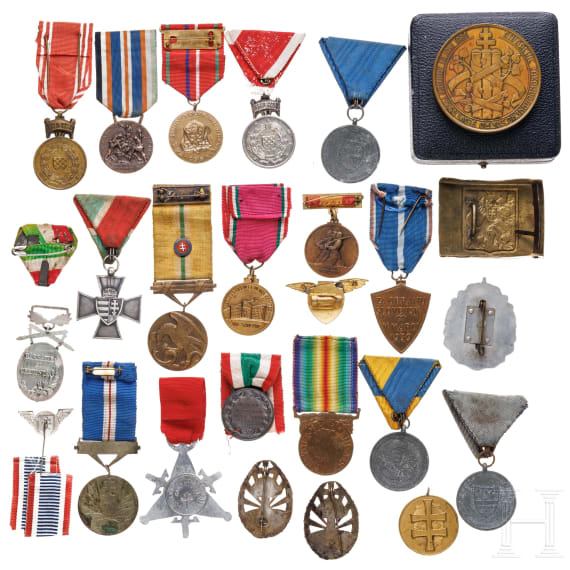 A small group of European medals and badges
