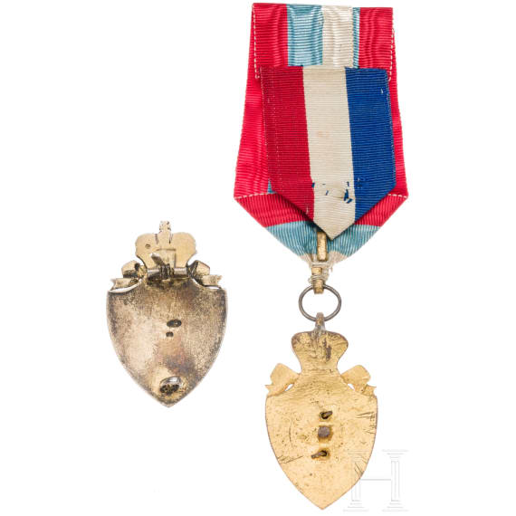 Two badges of the Russian Red Cross Society, circa 1900