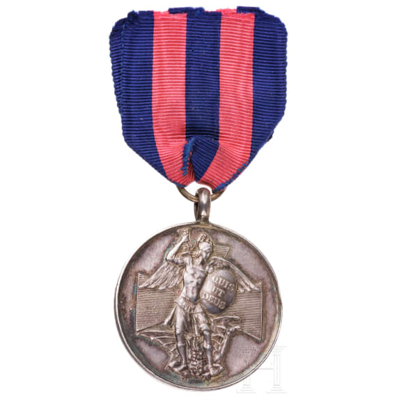 A silver medal of the Order of Merit of St. Michael