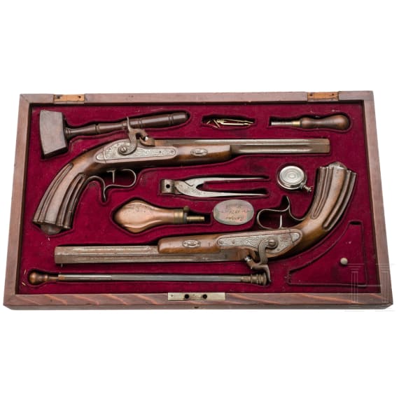 A pair of cased percussion pistols, modern repro's in 1850ies style