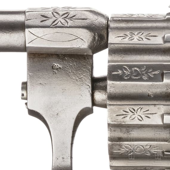 A pin-fire revolver, 12 shots, engraved; ca. 1870