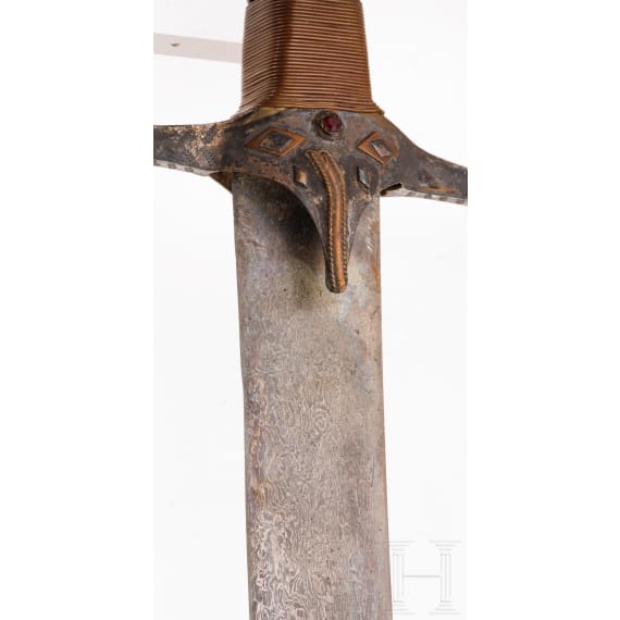 A Saudi Arabian shamshir with an older blade of Wootz Damascus, 20th century