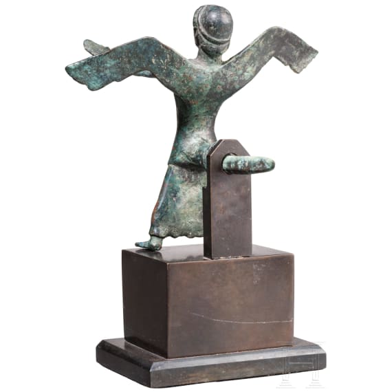 A Greek bronze statuette of Nike, 6th century B.C.