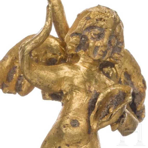 A late Hellenistic gold earring with dancing cupid, 1st century B.C.