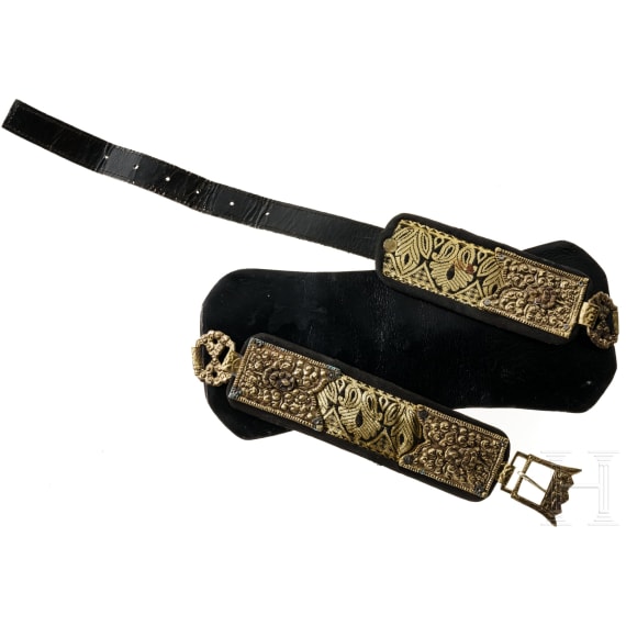 A Tibetan brass-mounted leather belt, circa 1900