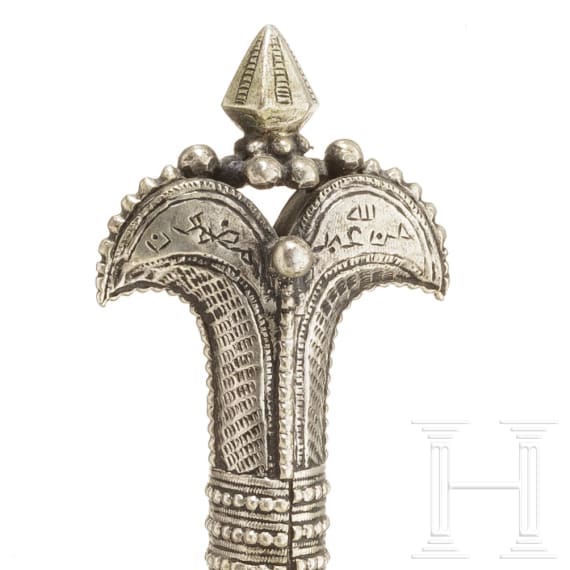 A silver and nickel-silver mounted Yemenite djambia, 20th century