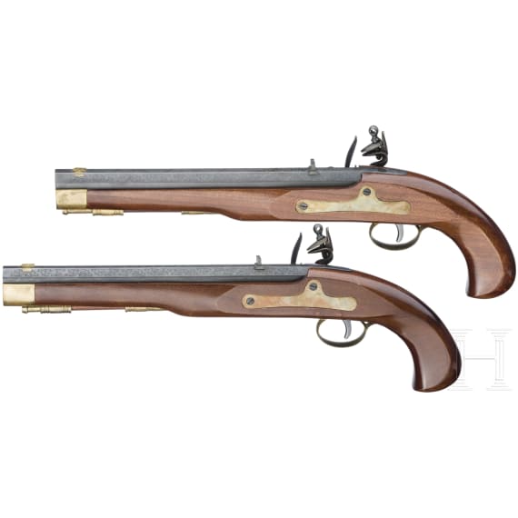 A pair of Italian flintlock pistols in a case, replicas, 20th century
