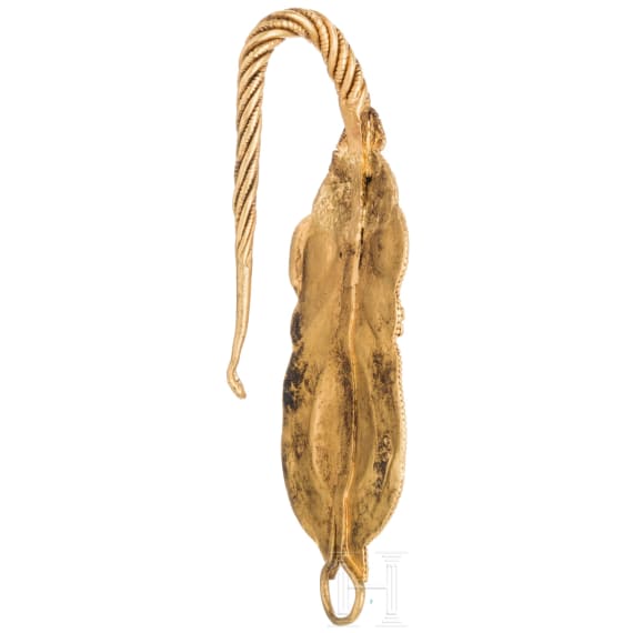 A lavishly decorated big Greek ear ornament made of gold, mid-4th century B.C.