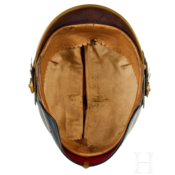 A helmet for Prussian One Year Guard Infantry volunteers, with shoulder boards and photo of owner
