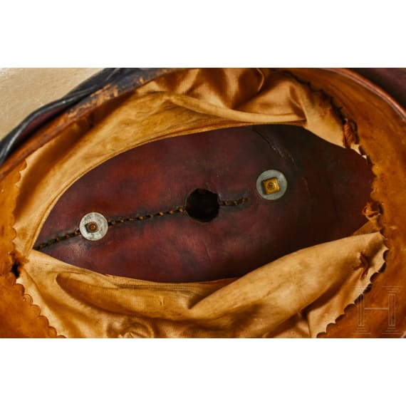A helmet for Prussian Officers in the 1st Guard Landwehr Cavalry Regiment, with bush