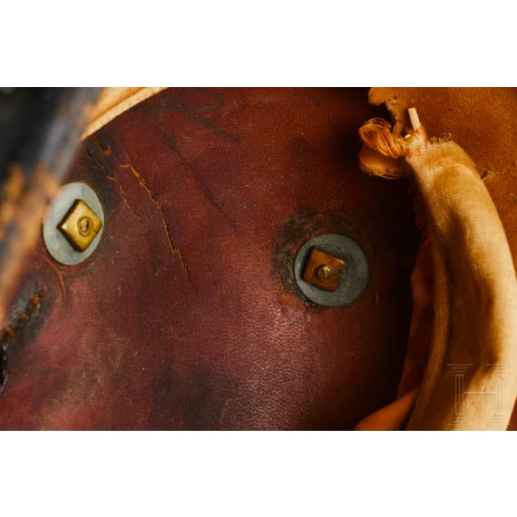 A helmet for Prussian Officers in the 1st Guard Landwehr Cavalry Regiment, with bush