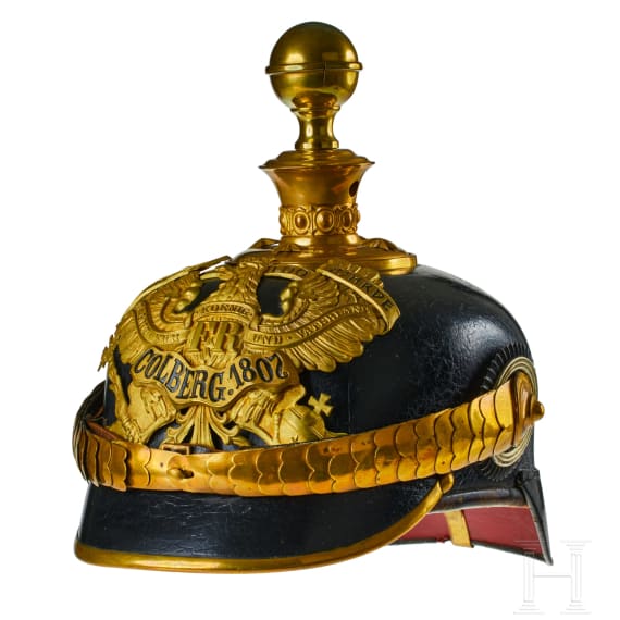 A helmet for Prussian Field Artillery Regiment 10 Officers with Colberg banner