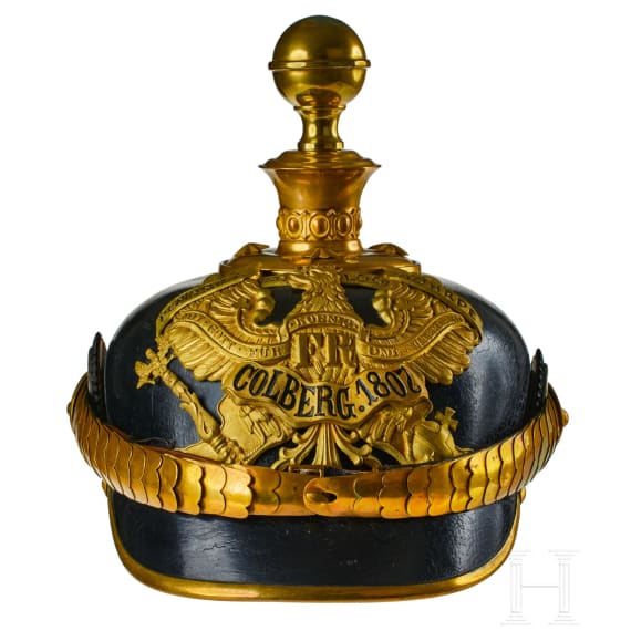 A helmet for Prussian Field Artillery Regiment 10 Officers with Colberg banner