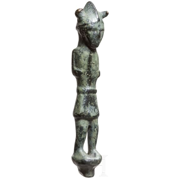 An Eastern Mediterranean bronze statuette of a warrior with horned helmet, 13th - 12th century B.C.