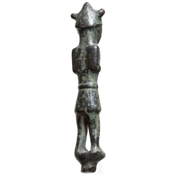 An Eastern Mediterranean bronze statuette of a warrior with horned helmet, 13th - 12th century B.C.