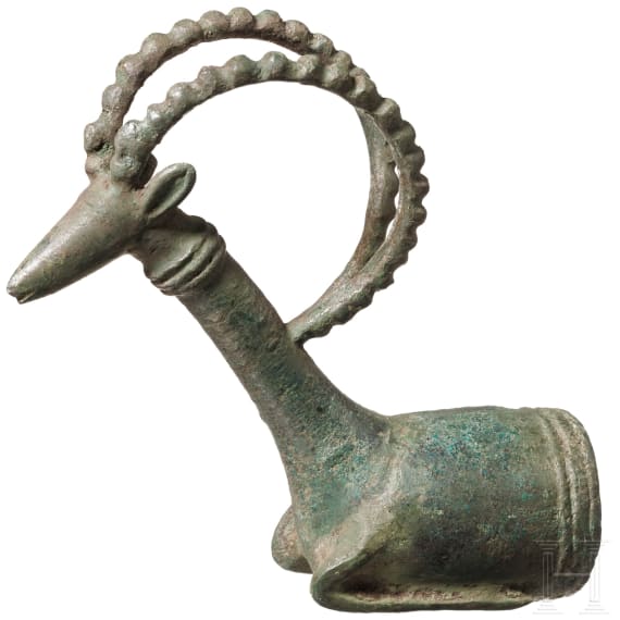A bronze stone head protome, the setting for a whetstone, Luristan, circa 1000 B.C.