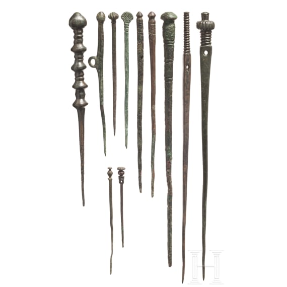 Eleven Near Eastern bronze cloak pins, late 2nd - early 1st millennium B.C.