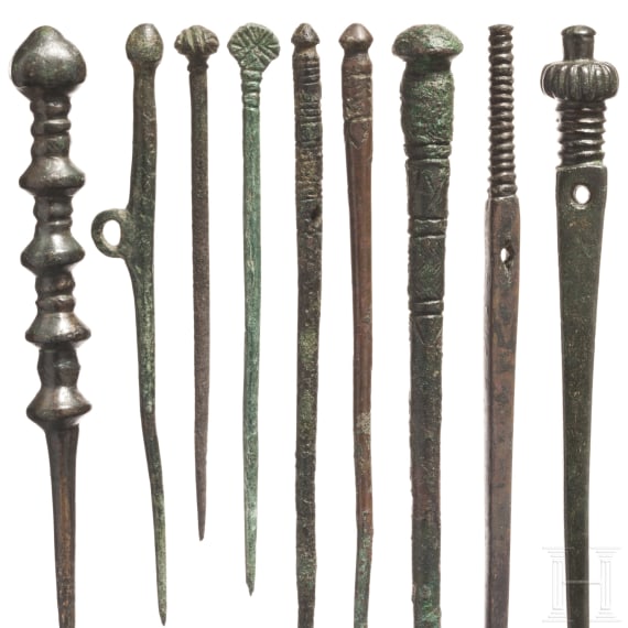 Eleven Near Eastern bronze cloak pins, late 2nd - early 1st millennium B.C.
