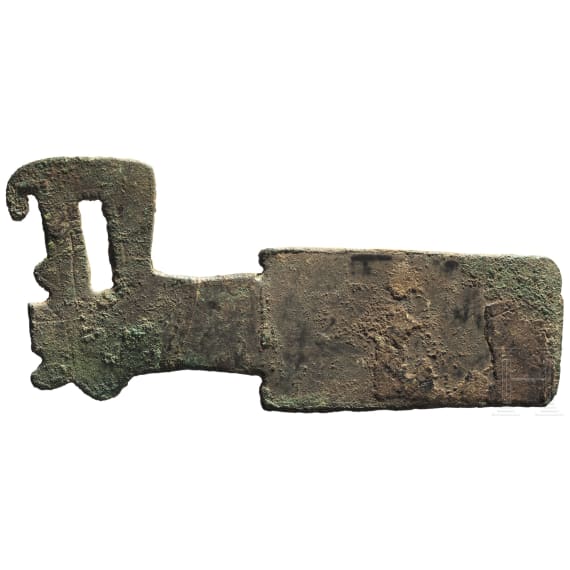 A Chinese flat bronze axe with animal head end, Western Zhou, 8th - 6th century B.C.