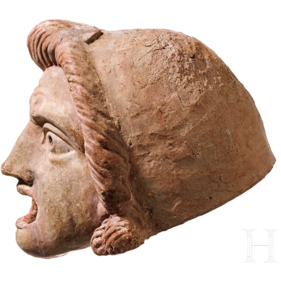 A Hellenistic terracotta theatre mask of the New Comedy, naive Ephebe type, 2nd century B.C.