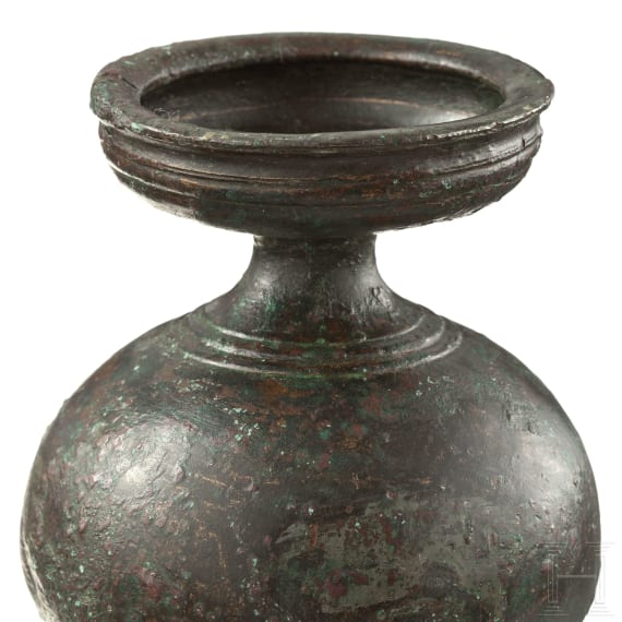 A Greek bronze ointment vessel, Greek, 4th century B.C.