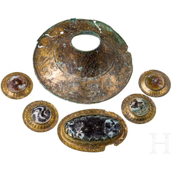 Six splendidly decorated, gilded Hellenistic bronze fittings, 3rd - 1st century B.C.