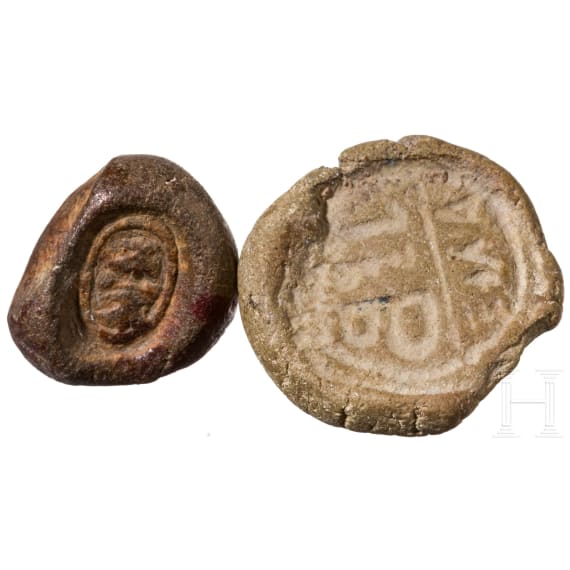 Five impressions of seals on clay, a clay model and a bronze punch with bird of prey, Greek, late antique and early Islamic, 3rd century B.C. - 8th century A.D.