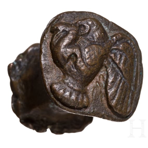 Five impressions of seals on clay, a clay model and a bronze punch with bird of prey, Greek, late antique and early Islamic, 3rd century B.C. - 8th century A.D.