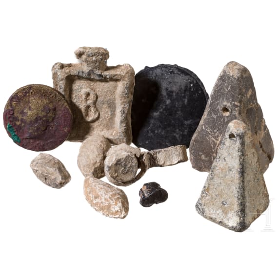 Ten small Hellenistic and Roman antiquities made of lead, bronze, clay and jet, 3rd century B.C. - 1st century A.D.