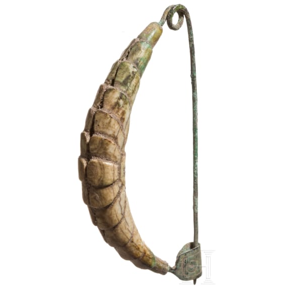 A bow brooch with bone cladding and Etruscan inscription, 7th century B.C.