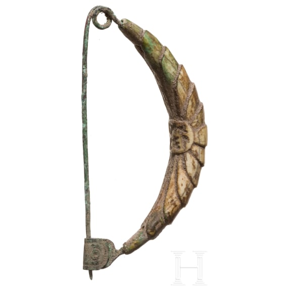 A bow brooch with bone cladding and Etruscan inscription, 7th century B.C.