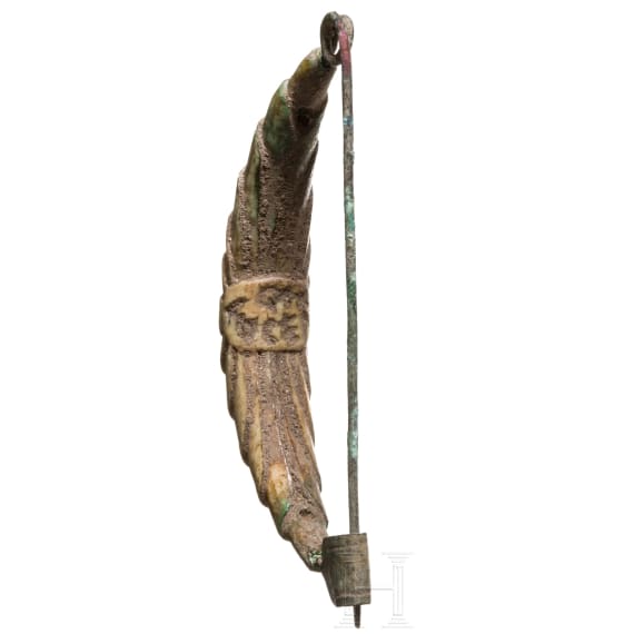 A bow brooch with bone cladding and Etruscan inscription, 7th century B.C.