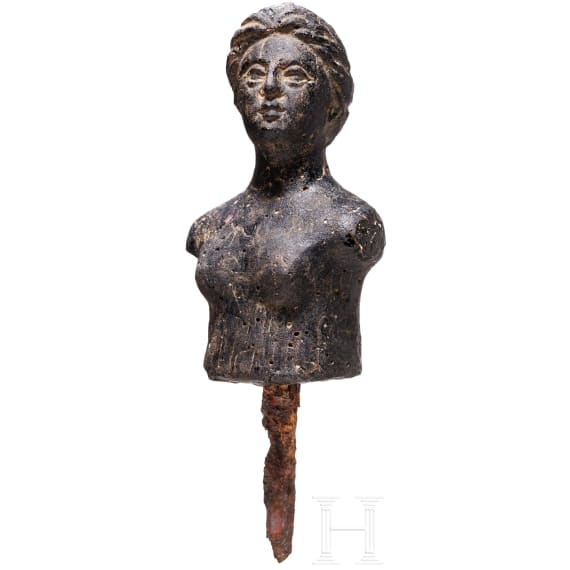 A Roman bust of a woman in black glass, 2nd century A.D.