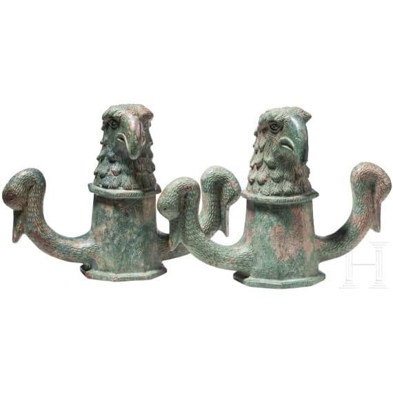 Two Roman bronze chariot body suspensions with eagle and swan heads, 2nd - 3rd century A.D.