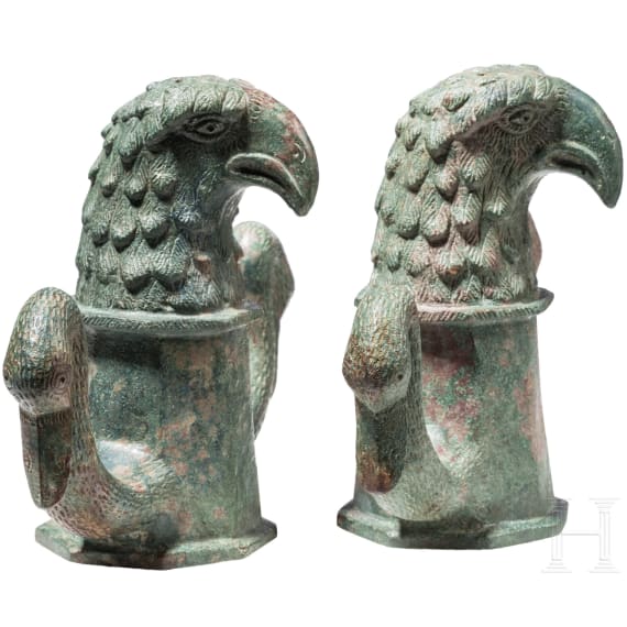 Two Roman bronze chariot body suspensions with eagle and swan heads, 2nd - 3rd century A.D.