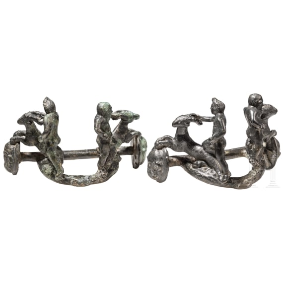 Two Roman bronze yoke fittings with satyr, silen and goats, late 1st - mid-3rd century A.D.